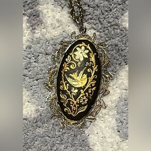 Damascene vintage black and gold etched pendant.